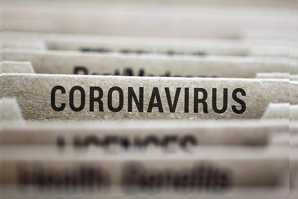 Bild mit Schriftzug Coronavirus, iStock/oonal